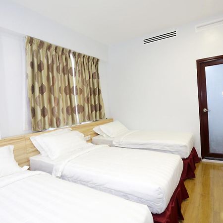 City Garden Hotel Тавау Стая снимка