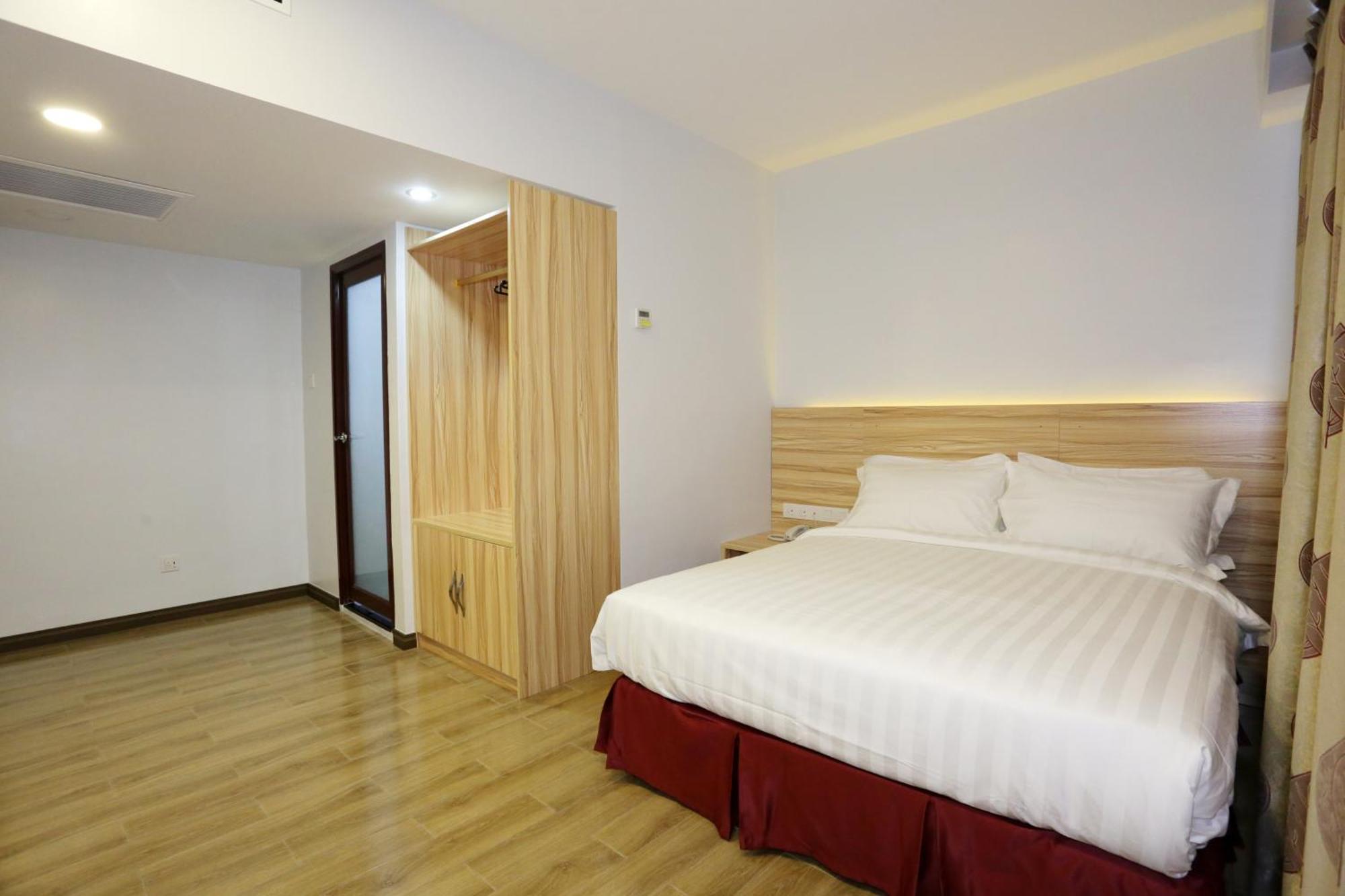 City Garden Hotel Тавау Стая снимка