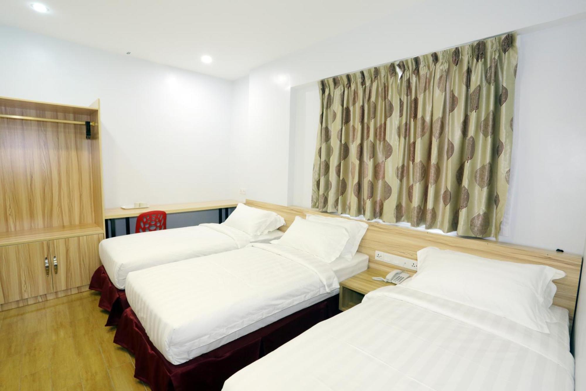 City Garden Hotel Тавау Стая снимка
