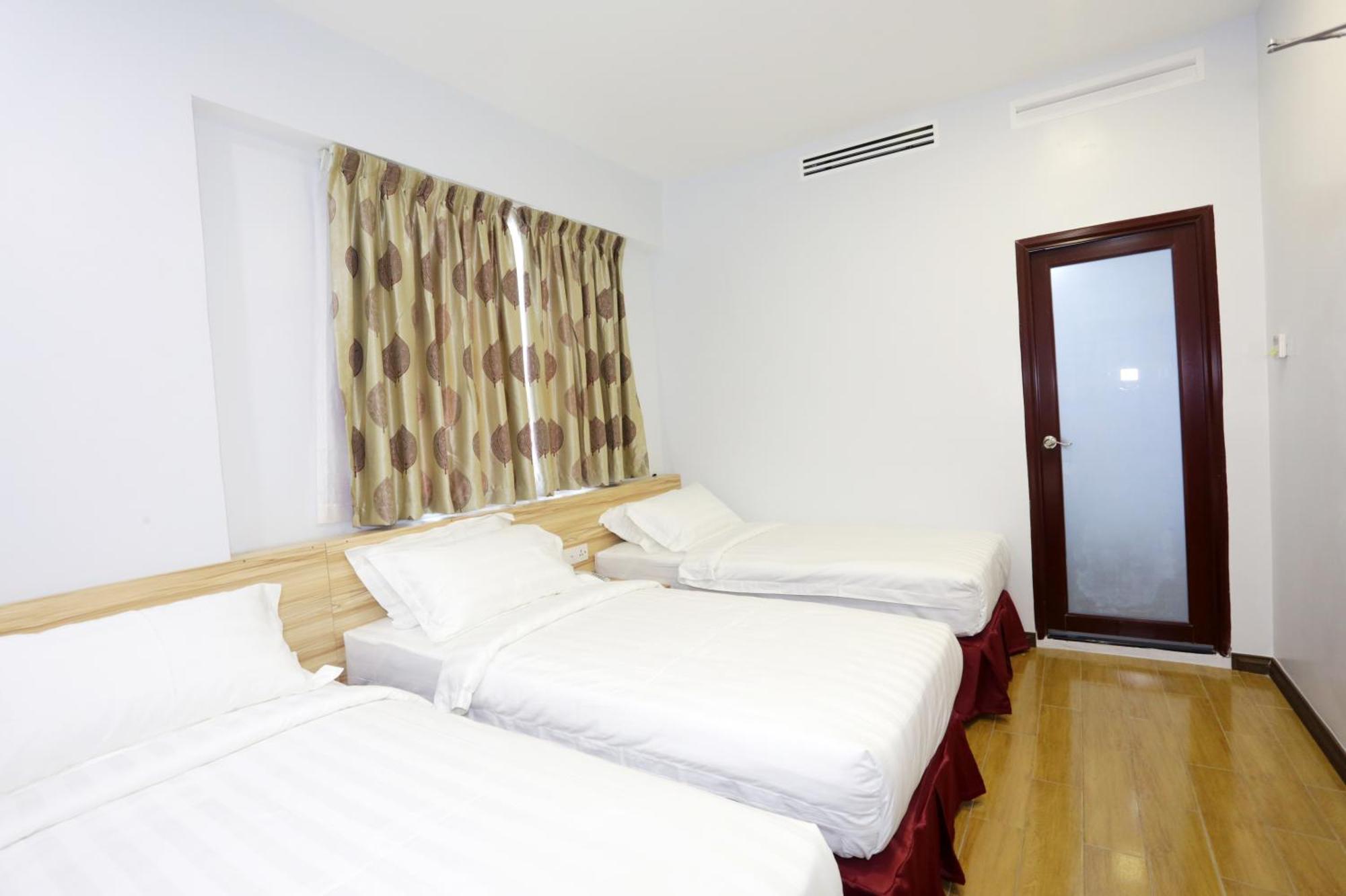 City Garden Hotel Тавау Стая снимка