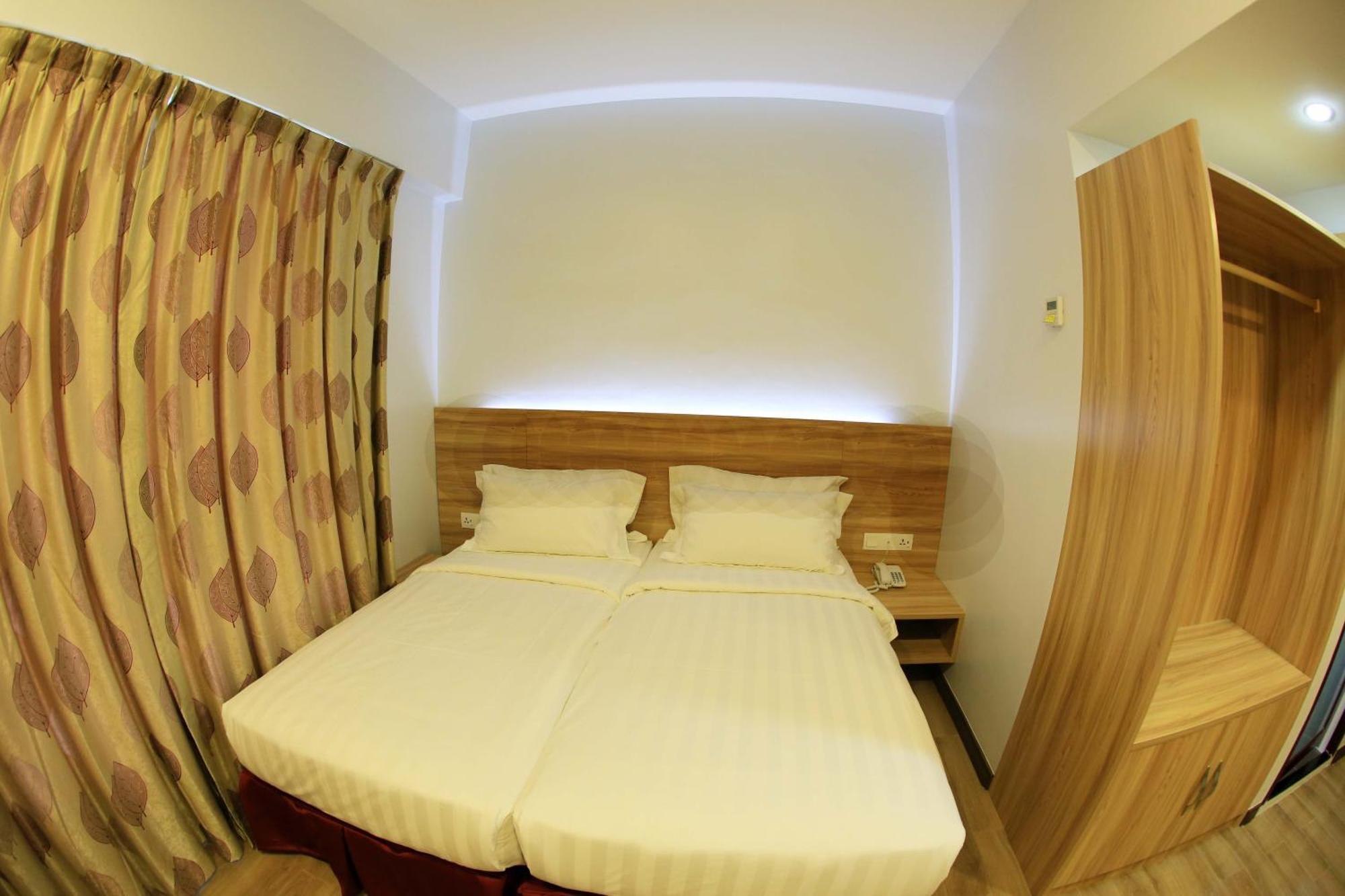 City Garden Hotel Тавау Стая снимка