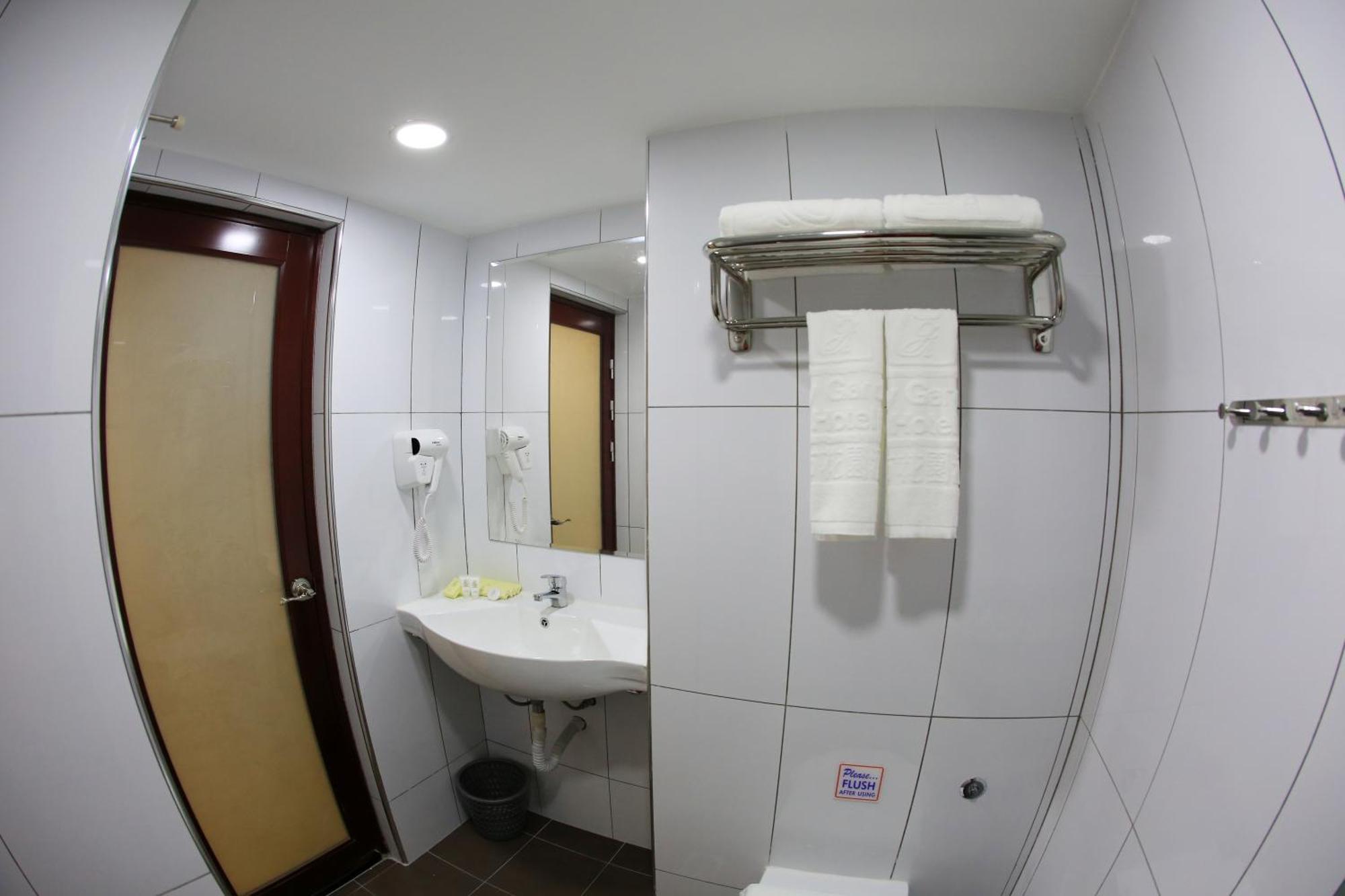 City Garden Hotel Тавау Стая снимка