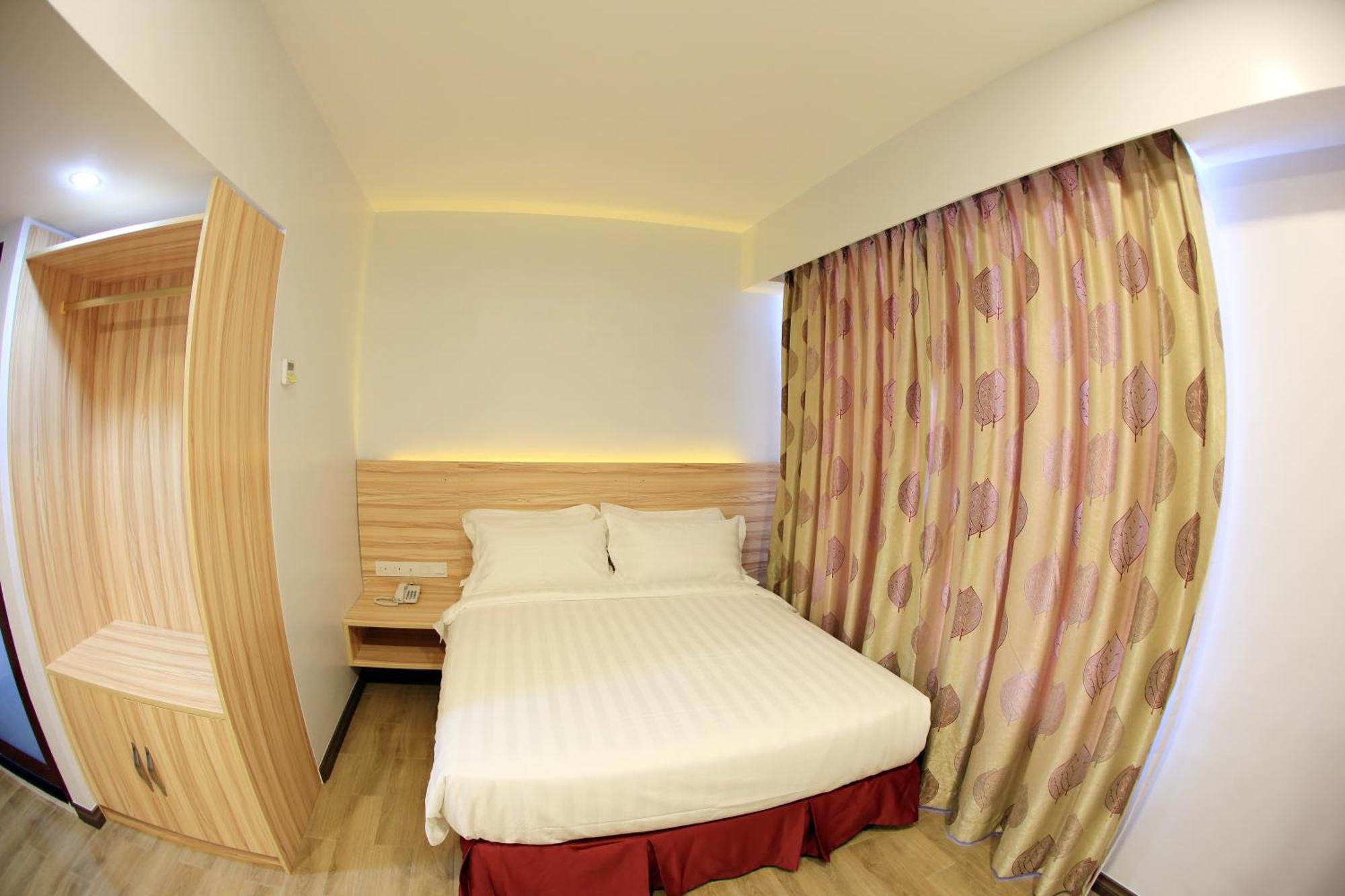 City Garden Hotel Тавау Стая снимка