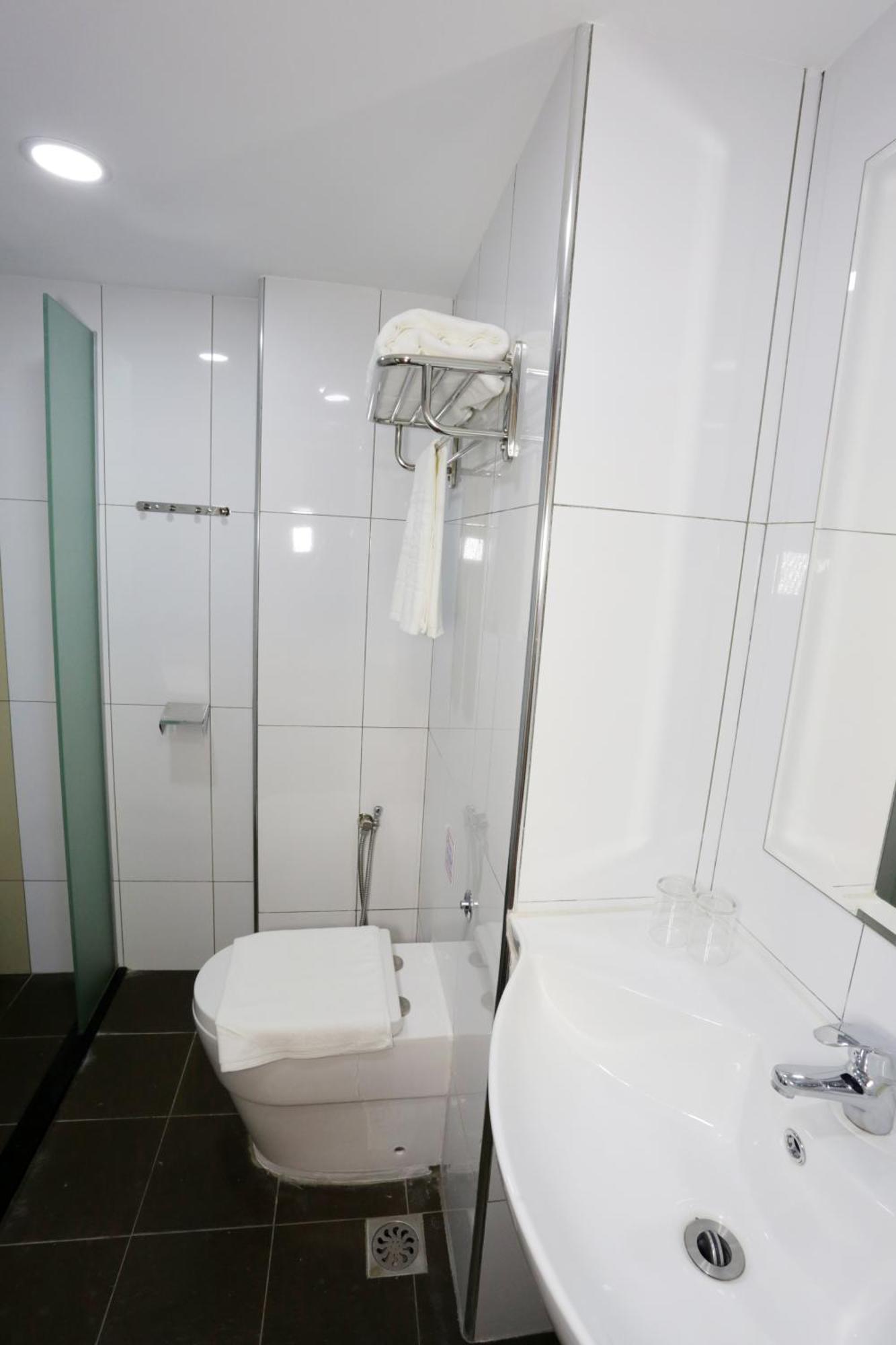 City Garden Hotel Тавау Стая снимка