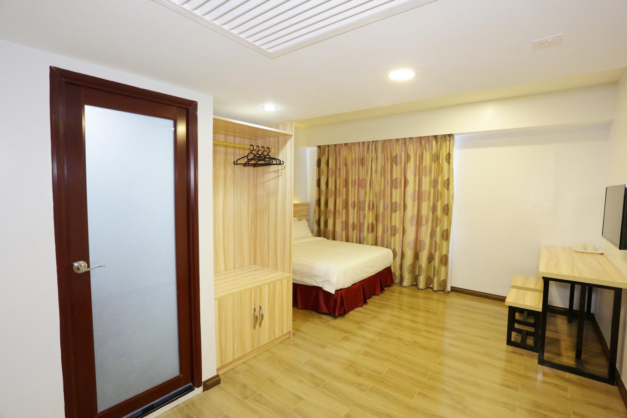 City Garden Hotel Тавау Стая снимка