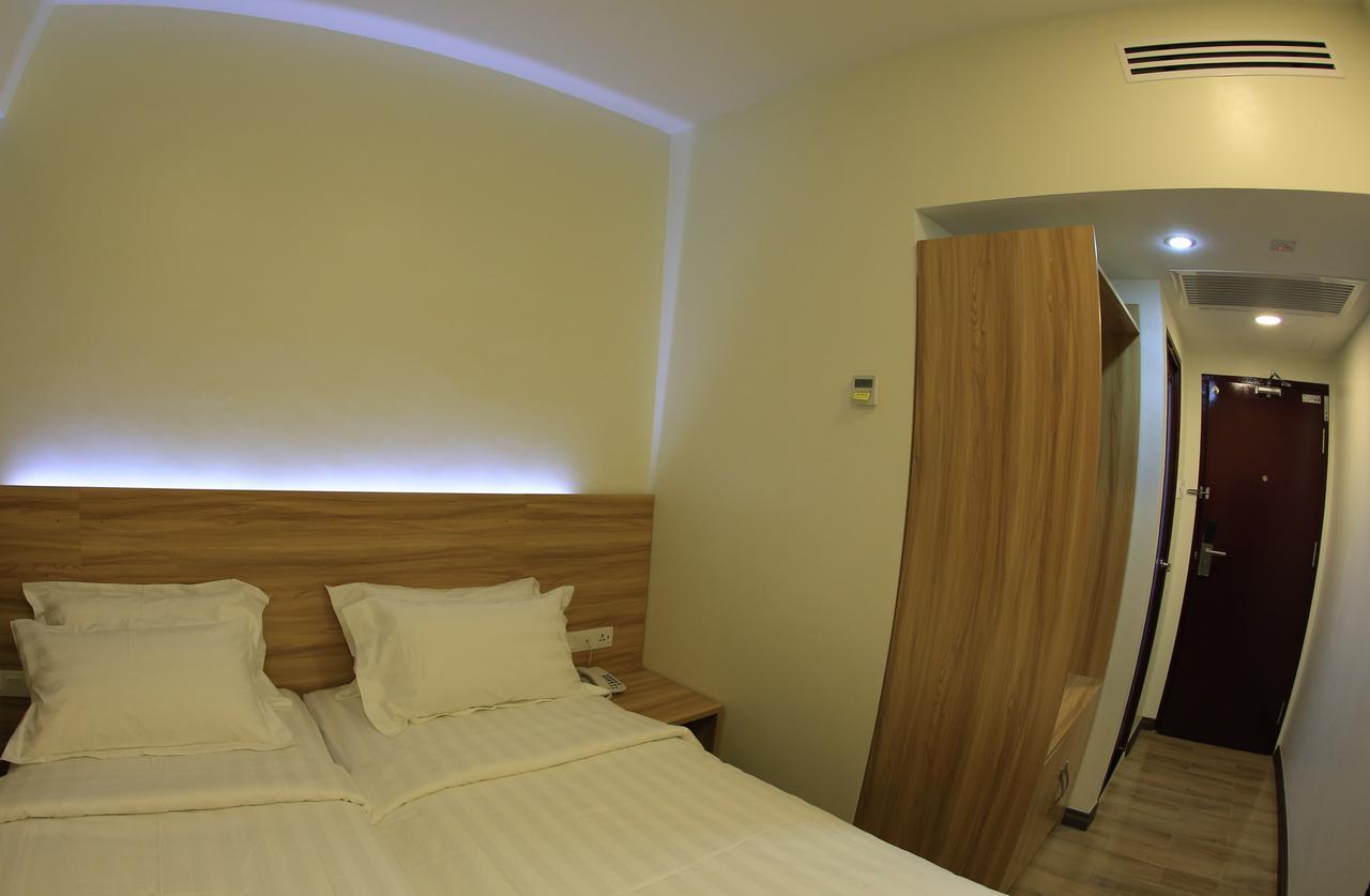 City Garden Hotel Тавау Екстериор снимка